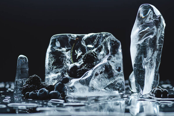 frozen berries in ice cubes