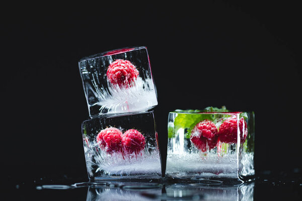 raspberries frozen in ice cubes