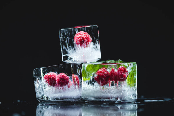 raspberries frozen in ice cubes