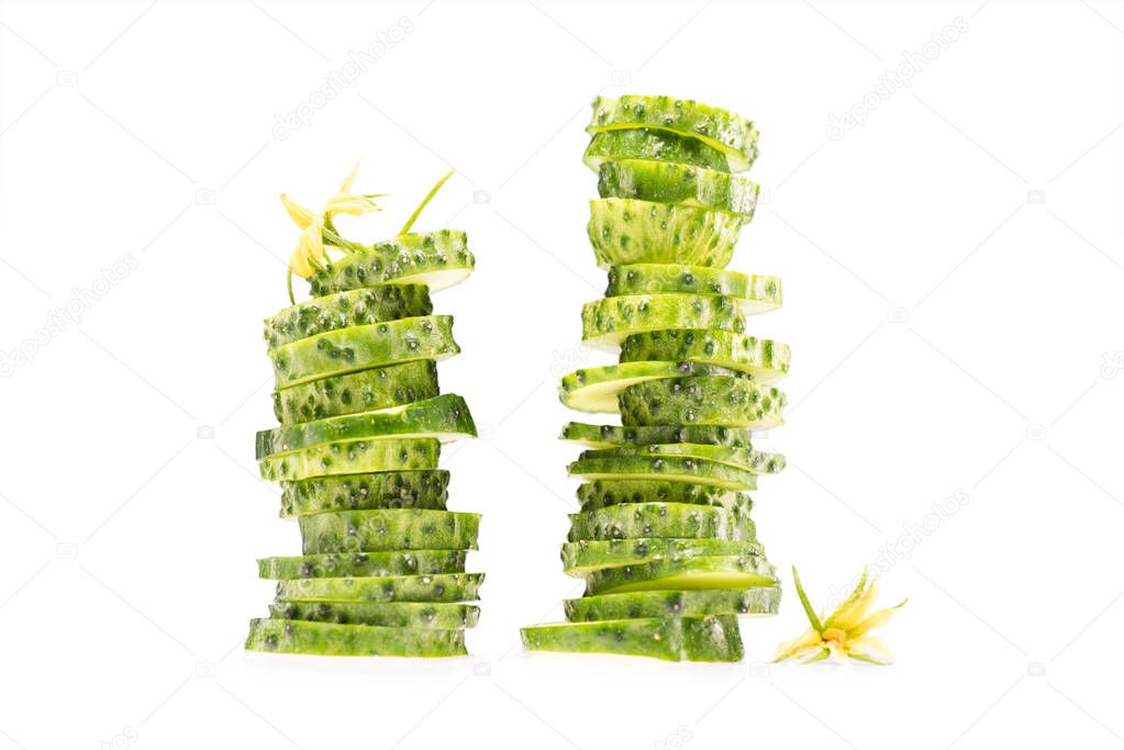 two stacks of sliced cucumbers