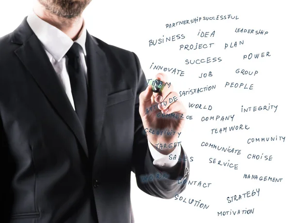 Hombre de negocios escribiendo en panel de vidrio — Foto de Stock