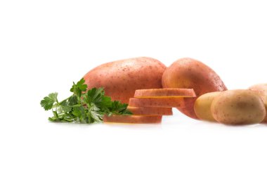 raw potatoes and parsley  clipart