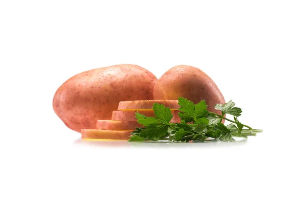 Raw potatoes and parsley — Stock Photo, Image