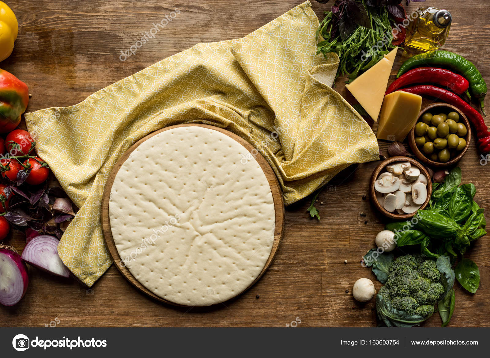 Pizza dough and fresh ingredients — Stock Photo © VadimVasenin 163603754