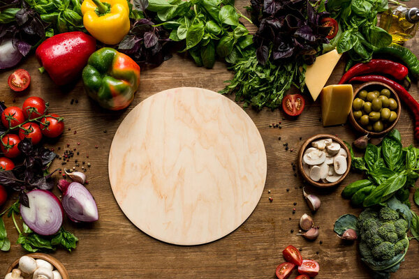 wooden board and fresh vegetables
