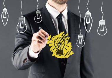 businessman drawing light bulb clipart