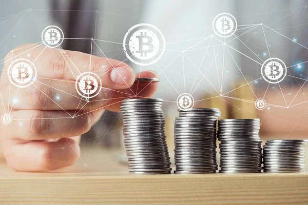 Person stacking bitcoins — Stock Photo, Image