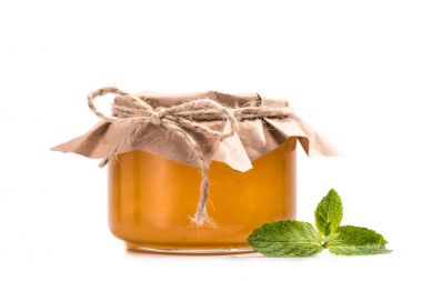 fresh honey in glass jar clipart