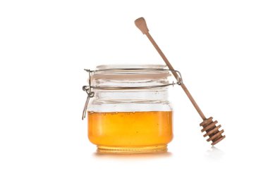 fresh honey in glass jar clipart