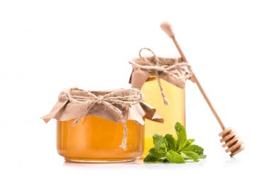 fresh honey in glass jars  clipart
