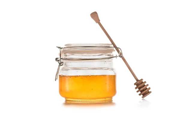 Свежий мед в стеклянной банке — стоковое фото