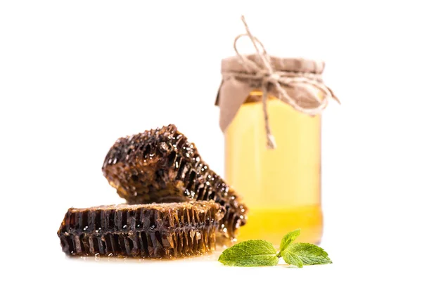 Honeycombs with mint and glass jar — Free Stock Photo