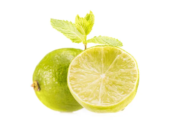 Limes and mint leaves — Stock Photo, Image