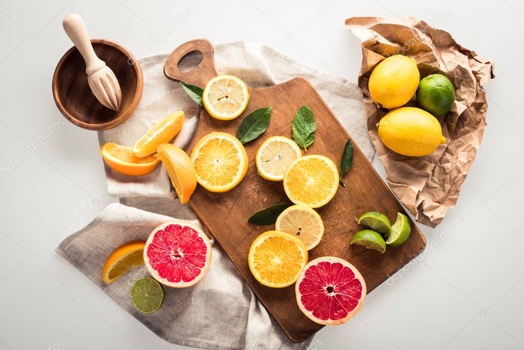 citrus fruits on cutting board