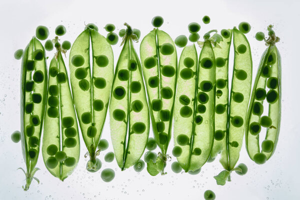 green peas floating in water