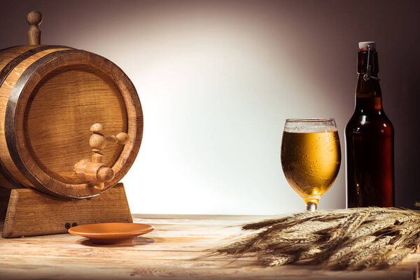 beer barrel, glass and bottle