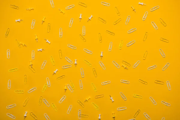 White paperclips and pins — Free Stock Photo