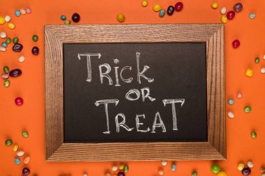 chalkboard with trick or treat inscription