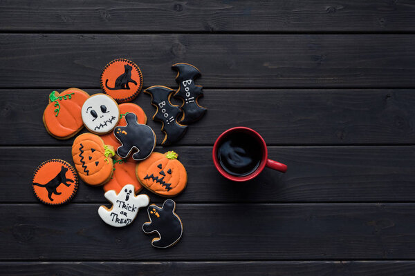 halloween cookies and cup of coffee