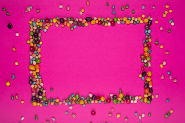 Renkli şekerler çerçevesinde — Stok fotoğraf