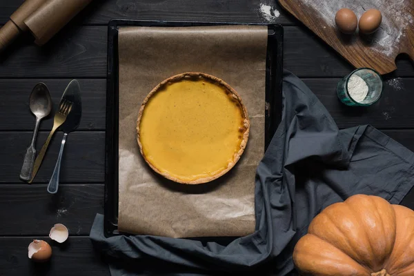 Pumpkin pie on baking tray — Stock Photo, Image