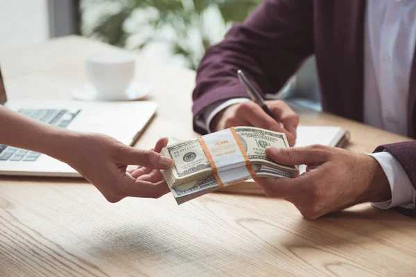 Businesspeople with dollar banknotes — Stock Photo, Image