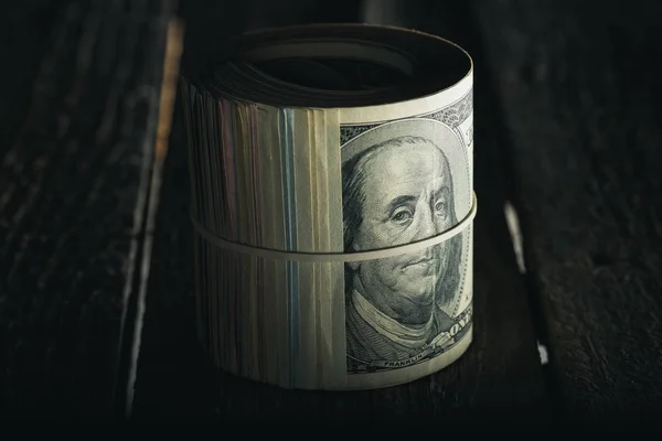 Dollar banknotes in roll — Stock Photo, Image