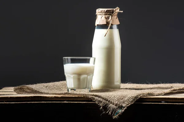 Fresh milk in glass and jar — Stock Photo, Image