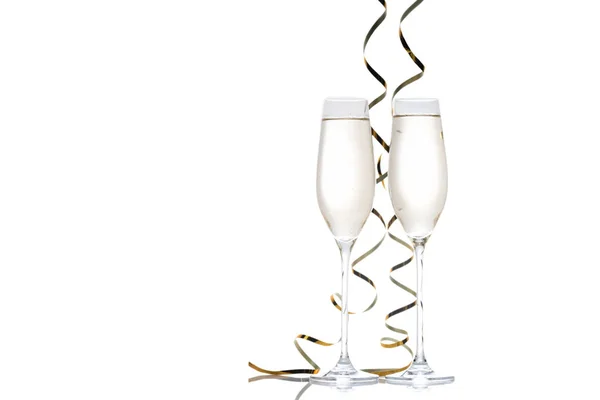 Glasses of champagne with ribbons — Stock Photo, Image