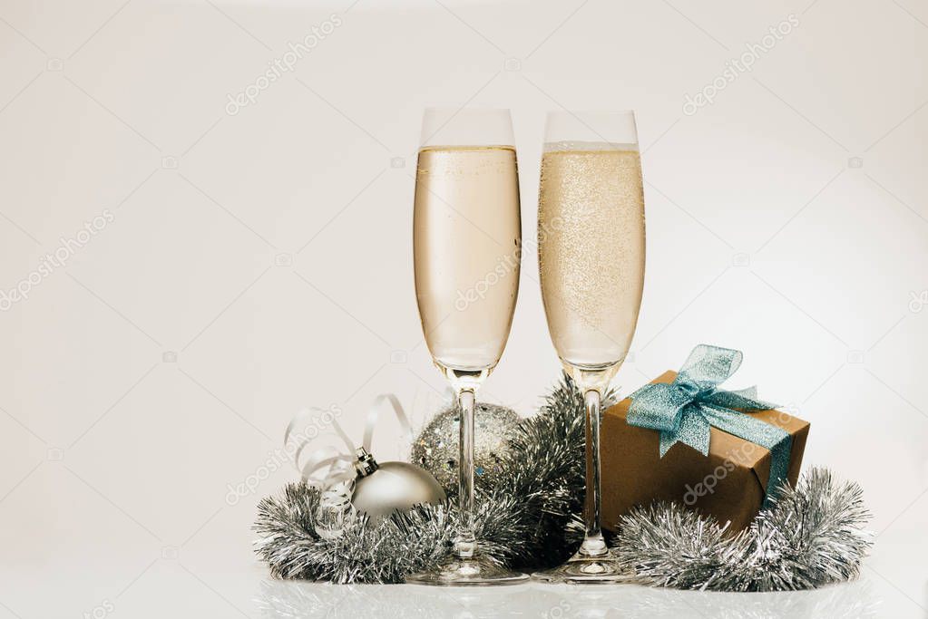 gift and glasses of champagne