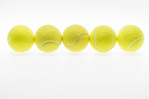 Palle da tennis in fila — Foto Stock