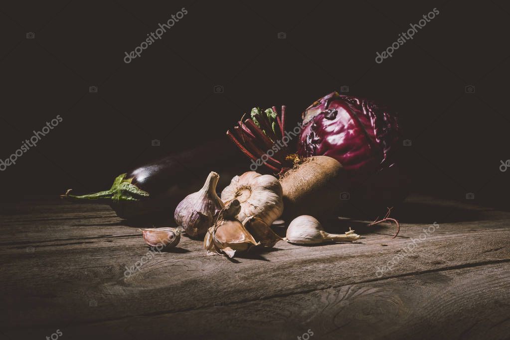 Close-up view or ripe autumn vegetables on wooden table