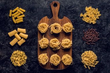 composition of various raw pasta clipart