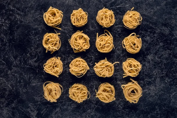 Raw pasta nests — Stock Photo, Image