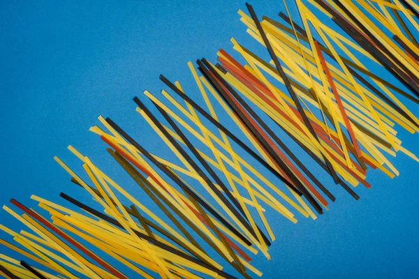 Raw colored spaghetti — Stock Photo, Image