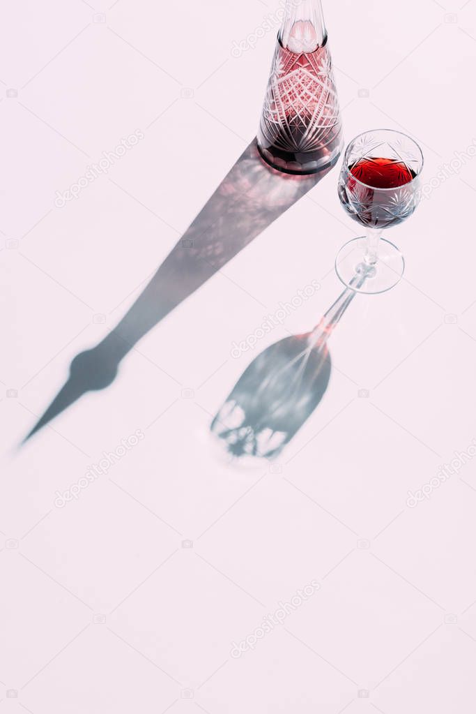 Glass and carafe with wine