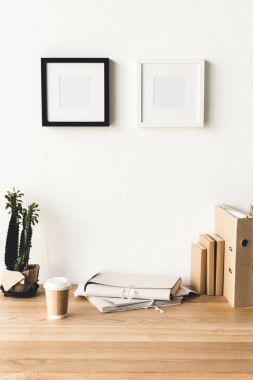 photo frames hanging on wall in room clipart