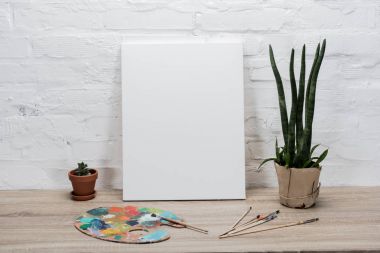 empty drawing easel on table clipart