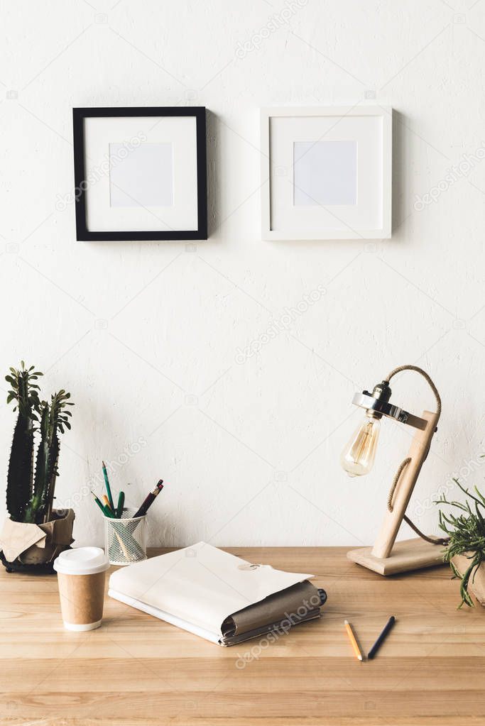 photo frames hanging on wall in room