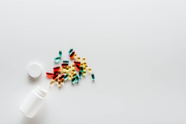 colorful pills and container