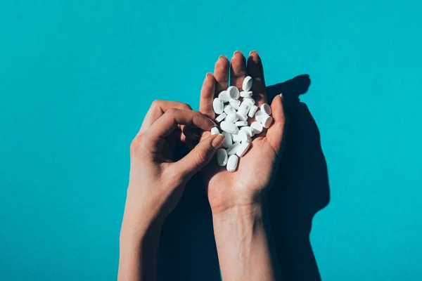 Pills in hands — Stock Photo, Image