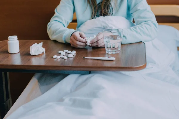 Sick person taking medicine — Stock Photo, Image