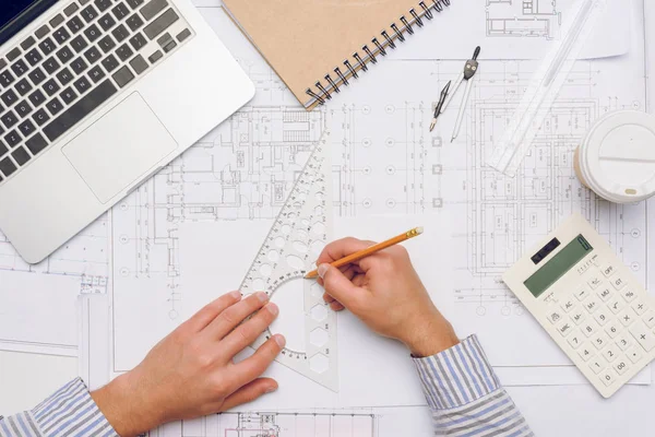 Architect working with blueprints — Stock Photo, Image