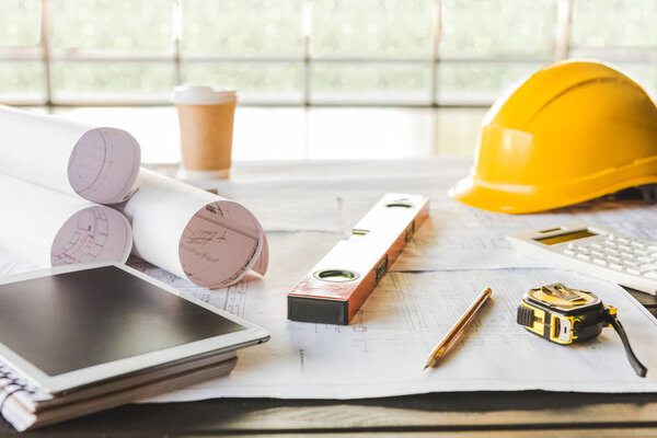 tablet and architectural blueprints