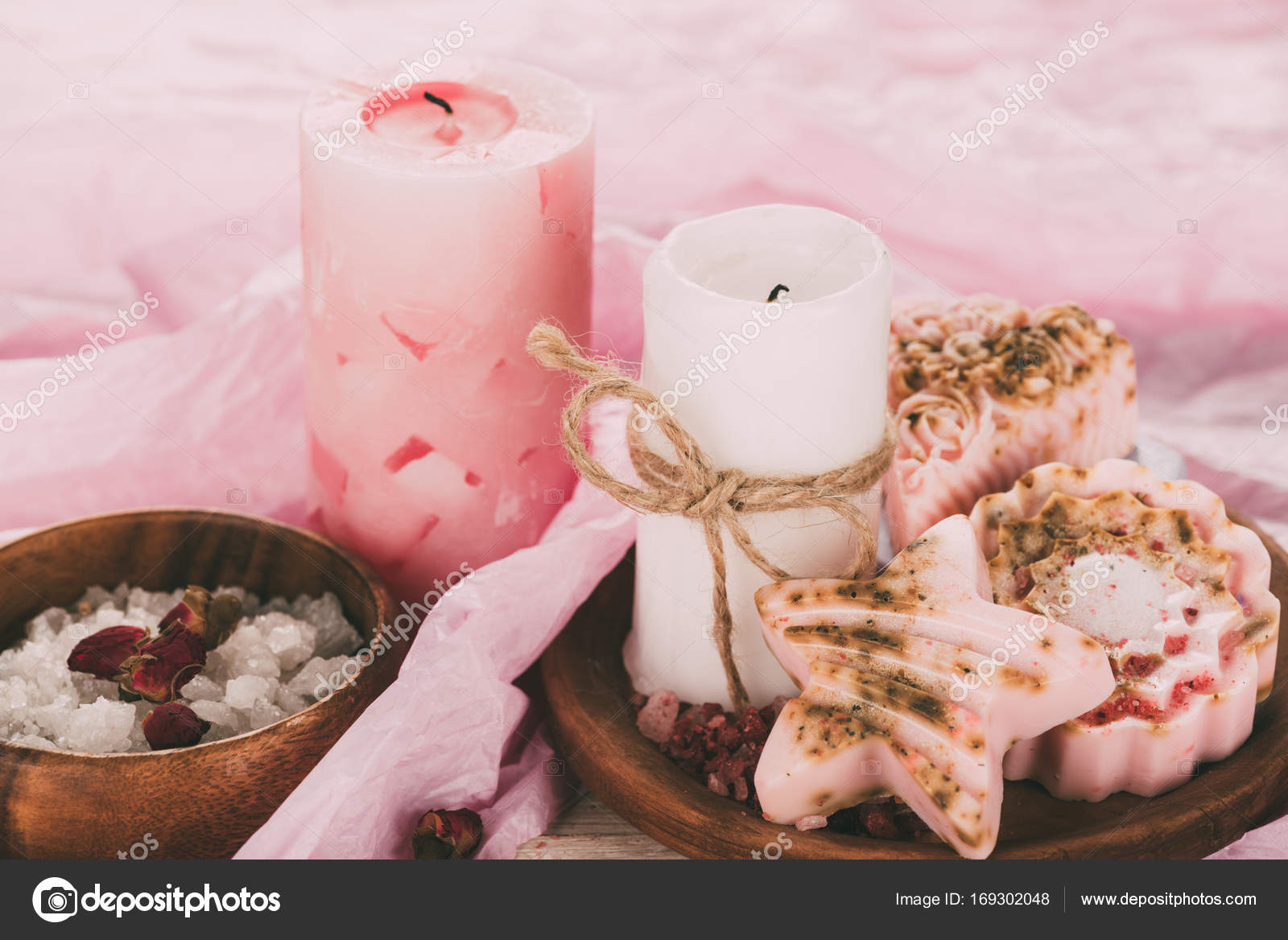 Two candles, bathroom salt and soap Stock Photo by ©VadimVasenin 169302048