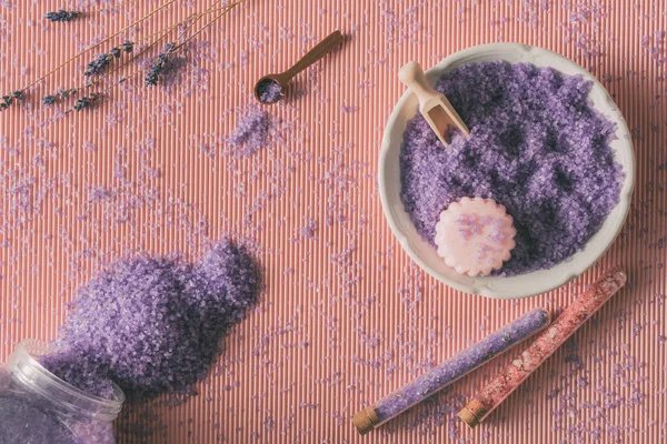 Bathroom salt in plate and flasks — Stock Photo, Image