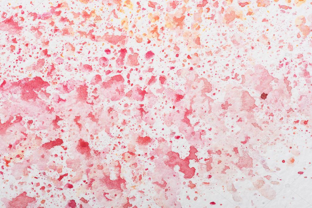 red and pink watercolor stains