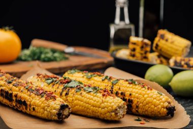 grilled corn with spices clipart