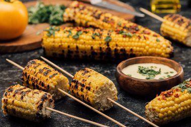 grilled corn with spices clipart