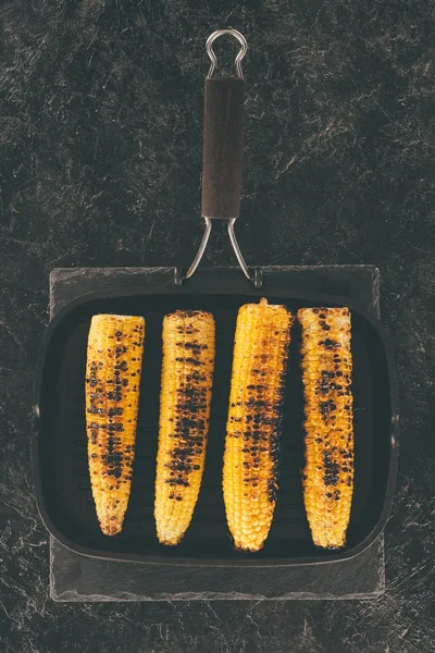 Grilled corn on frying pan — Stock Photo, Image